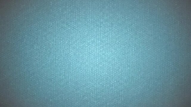 A simple, textured and faded blue background with a subtle, dark vignette effect on the edges