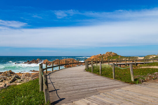 Wooden boardwalk along the Atlantic ocean coast, Portugal
