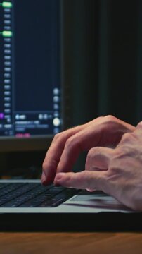 Close up: businessman hands working on laptop or computer keyboard for trading or stock market investing. Male investor using touchpad. Trader palm, freelance or remote working