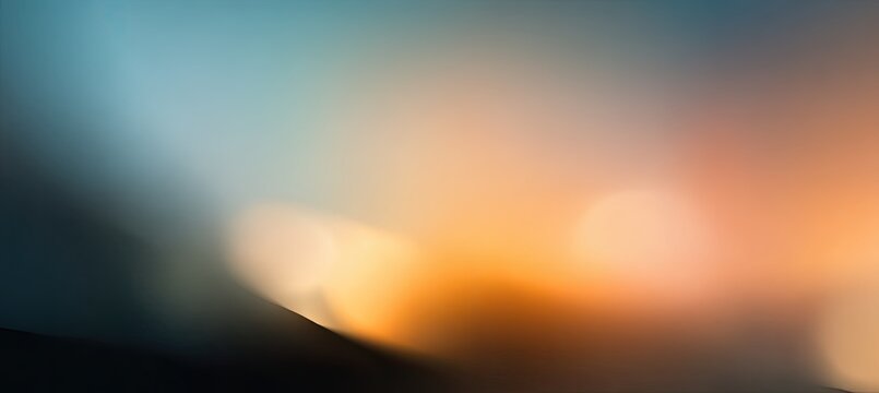 A soft, blurred image showcases a gradient of blue and orange hues, creating an abstract and ethereal visual experience.