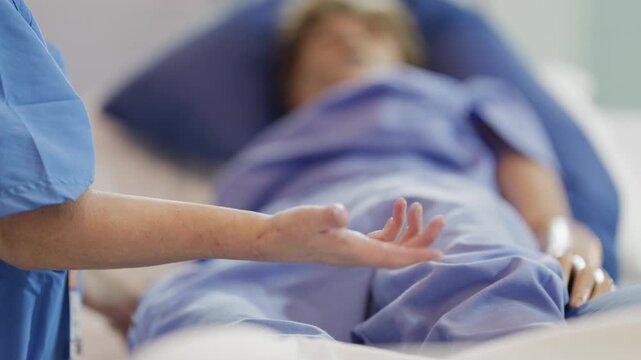 Nurse performing patient care on a medical mannequin