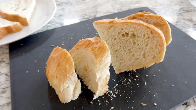 Sliced Bread Laid Out On Cutting Board