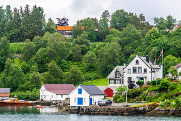 Fototapeta premium Sailing, Norwegian Sea, Hjorundfjord, Finnmark, Norway, Arctic town, Norwegian fjords
