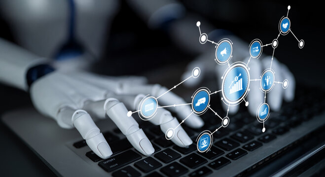 A robotic hand engaged with a laptop showcases advanced technology and data analytics. This image embodies the future of AI-driven interfaces and interactions. Tessel