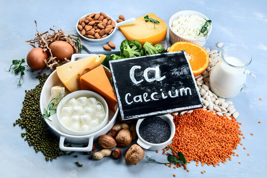 Calcium-rich foods displayed with chalkboard sign emphasizing calcium importance