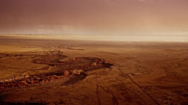 Dramatic aerial view of snow clouds overtaking the New Mexico plains landscape
