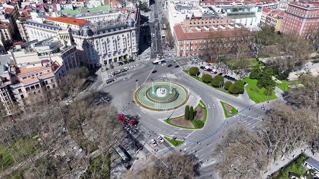 Neptuno Fountain At Madrid Spain. Famous Roundabout. Downtown Cityscape. Cultural Heritage Skyline. Neptuno Fountain In Spain. Madrid Street Scene.