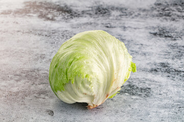 Obraz premium Raw iceberg salat over background