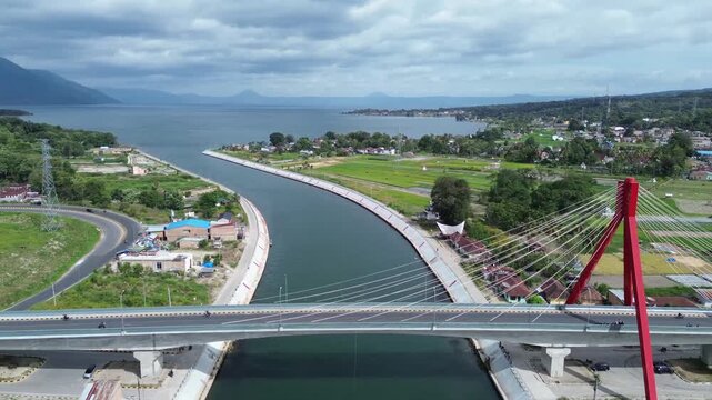 Cinematic aerial drone shot of Jembatan Tano Ponggol in Pulau Samosir,