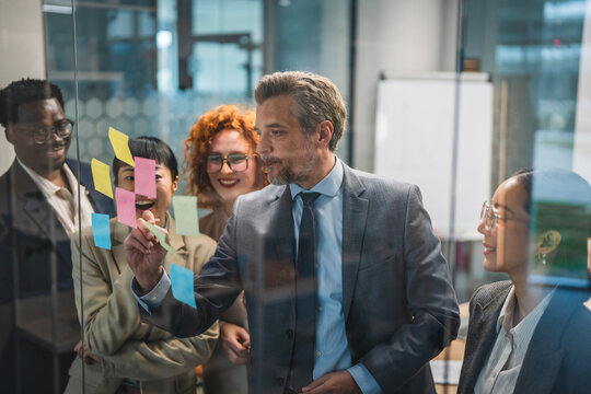 Diverse business team collaborating during brainstorming session