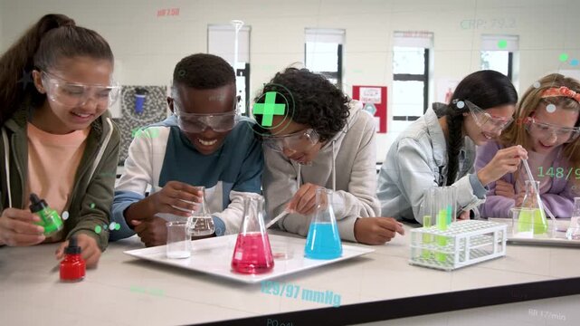 Left student squeezing dropper, group mixing flasks and tubes, observing color change for science
