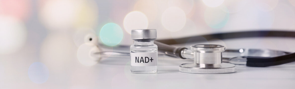 Hopeful nad+ longevity treatment concept featuring medicine vial and stethoscope symbolizing future health and wellness breakthroughs