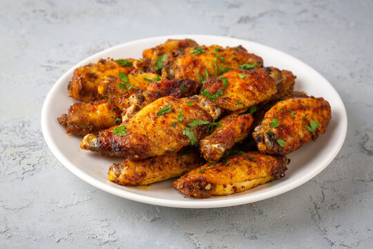 Oven-grilled chicken wings. Turkish name: Tavuk kanat