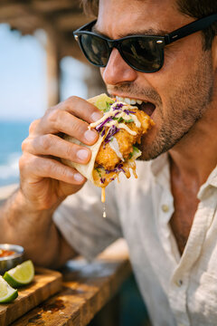 Crispy fish tacos editorial street food photography close-up coastal traveler taking bite beach shack cinematic sunlight