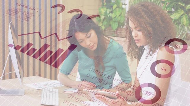 Two women at desk, right tapping tablet and causing business charts, binary stream for decisions