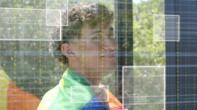 Man holding rainbow flag by glass, looking up while tech UI boxes activating, showing pride
