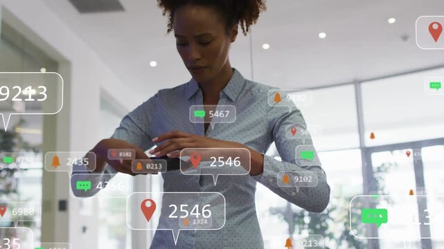 Vertical video: Office woman noticing notifications tapping and rotating phone while icons floating