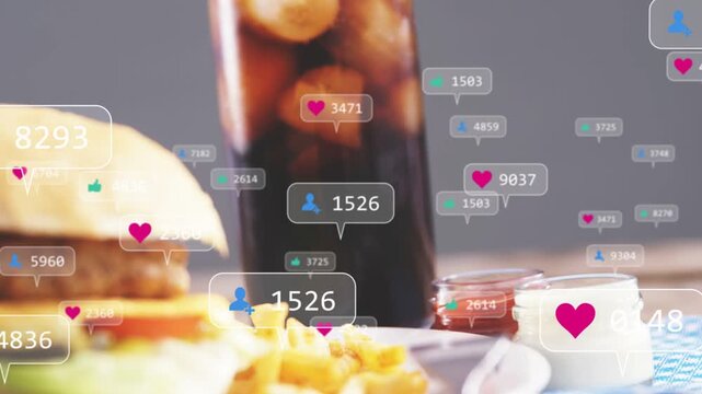 Camera pulling back over burger and fries with cola, animated reactions showing rising food buzz