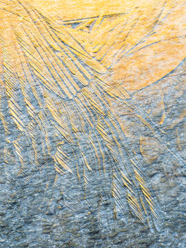 Abstract background of ice crystals on a rock surface, creating a unique texture, Alveo Presena,Trentino,Tonale Pass,Italy.