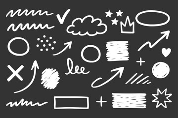 Hand-drawn chalk doodles and symbols on blackboard background © DzgnVibe