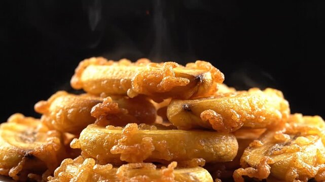 Close-up of crispy seviyan snack stacked in a pattern on a black background