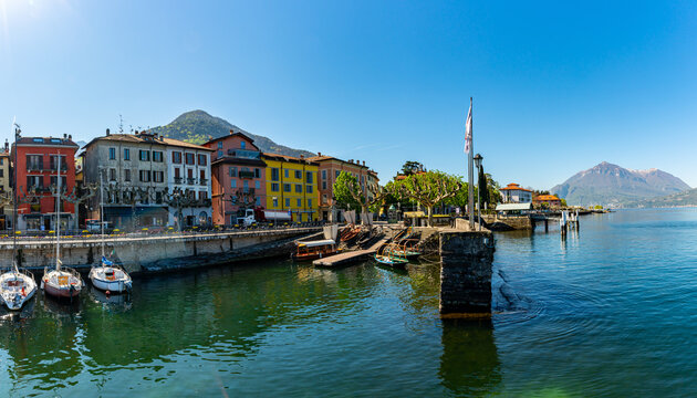 Image of the lakefront of Bellano, on Lake Como, with houses and the marina.
