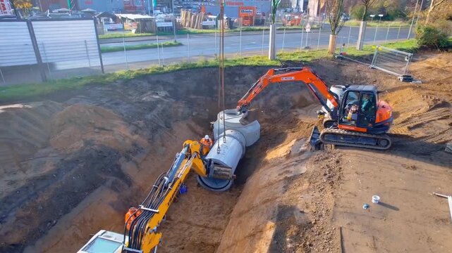 Excavator digging trench for sewer laying connecting underground storm sewer system 