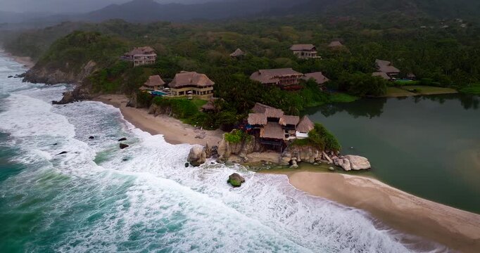 Scenic location of resort along Los Naranjos coastline and on Rio Piedras. Drone