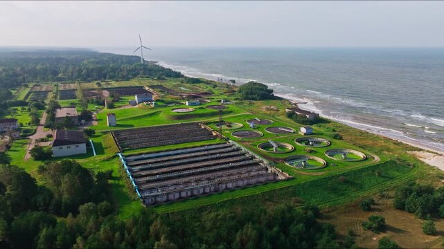 Wastewater facility near coast with wind turbine Liepaja Latvia