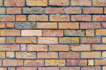 Obraz premium Brick wall showing weathered mortar pattern on exterior