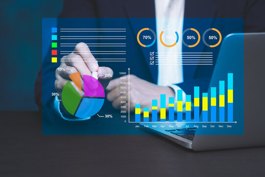 Business person analyzing financial charts and growth data