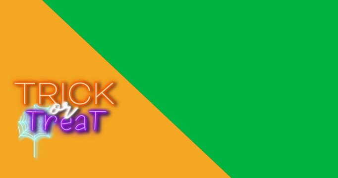Digital animation of neon trick or treat text banner against yellow and black dual tone background