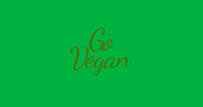 Digital animation of go vegan text banner against black background