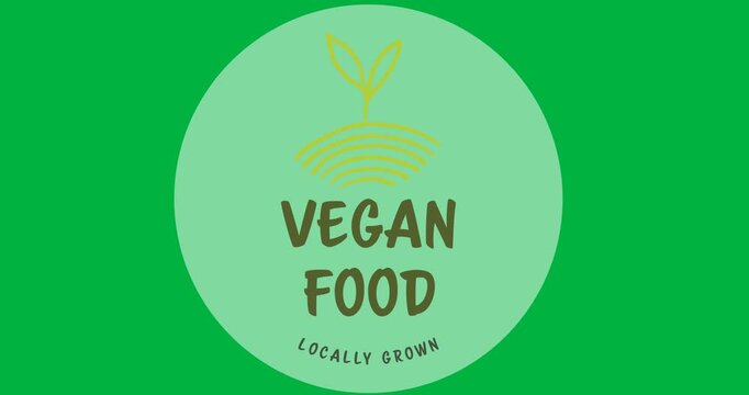 Locally grown vegan food text with leaves icon over a grey round banner on black background