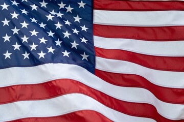 Fototapeta premium An american flag is waving in the wind. 