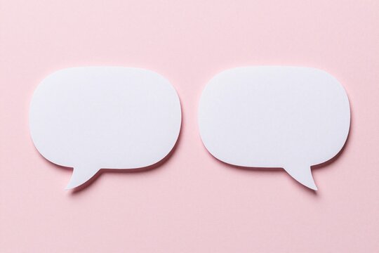 Two white speech bubbles on a pink background