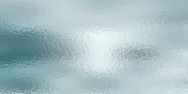 Shiny silver foil texture. Soft blue foil glass texture background. Abstract gradient bright light reflection and shiny rough texture surface. Glass effect background