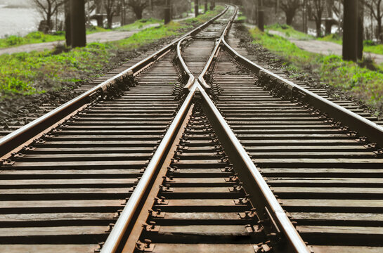 crossing Railway track  perspective View of the cross crossing railway train tracks are on a railroad track