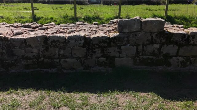 Heddon-on-the-Wall Northumberland UK: 2nd April 2026: Close-up drone dolly shot captures a small section of the Roman Wall (Hadrian's)