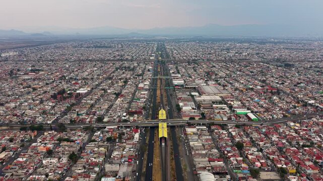 Drone footage of residential areas and traffic in Ecatepec