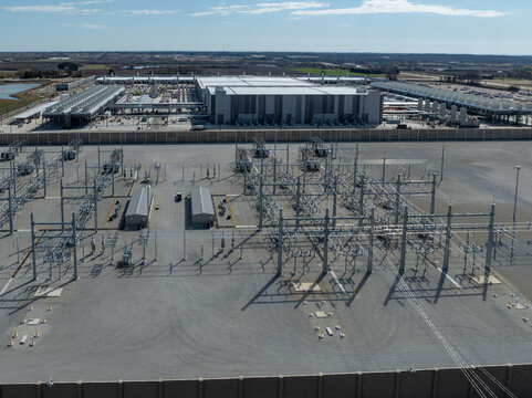 Mount Pleasant, Wisconsin, USA - April 11, 2026: Aerial view of Microsoft data center with electrical substation and cooling systems supporting cloud computing operations.