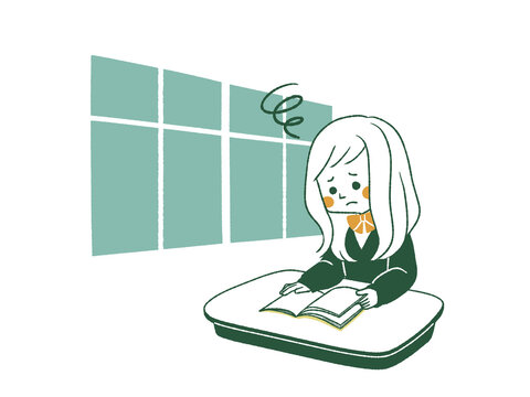 教室で本を読んでいる困った表情の女子学生