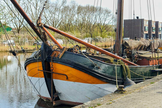Maritime Heritage And Nautical Tourism Close-Up Of Tjalk Traditional Sailing Boat Moored At A Quay In Krommenie Netherlands Showcasing Dutch Maritime History
