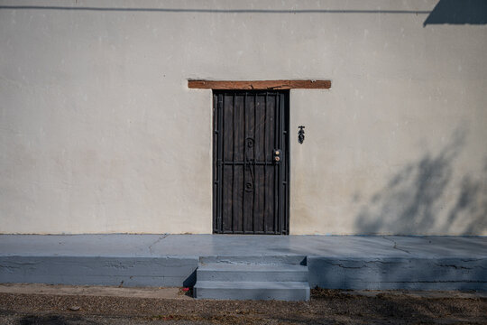 door in an adobe wall
