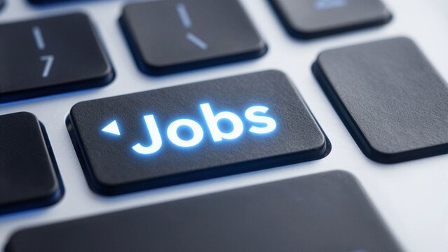 Close-up of a computer keyboard with the 'Jobs' key illuminated in blue light, symbolizing online job searching.