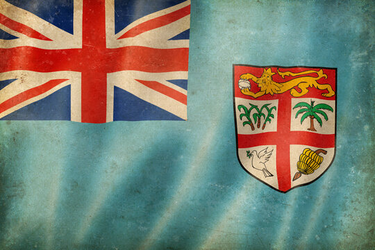 Old vintage flag of Fiji, worn and stained