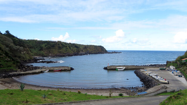 Porto Formoso, S&atilde;o Miguel, Portugal. main part of the village overlooks this fishing harbour. This location has been used to film netflix's show Rabo de Peixe (Turn of the Tide)