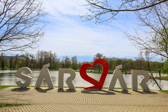 creative outdoor S&aacute;rv&aacute;r city sign with heart symbol placed near water &ndash; clear landmark representing Hungarian spa town in open public space, 6. april 2026