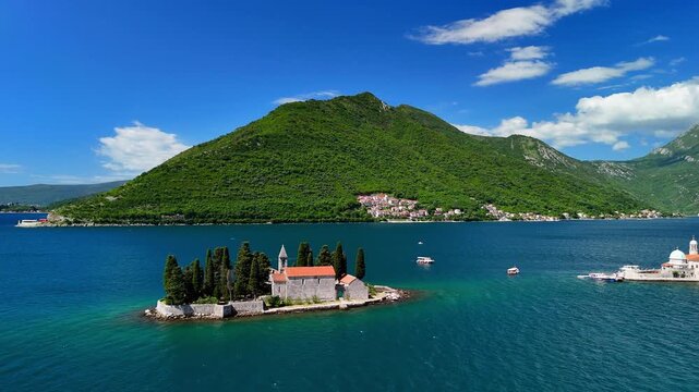 Aerial view of islands in the Bay of Kotor, featuring Our Lady of the Rocks Church and the Saint George Benedictine Monastery, Montenegro.