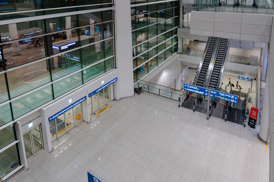 April 14, 2026, Incheon, South Korea - Interior view of Incheon International Airport Terminal 2 with escalators and passengers